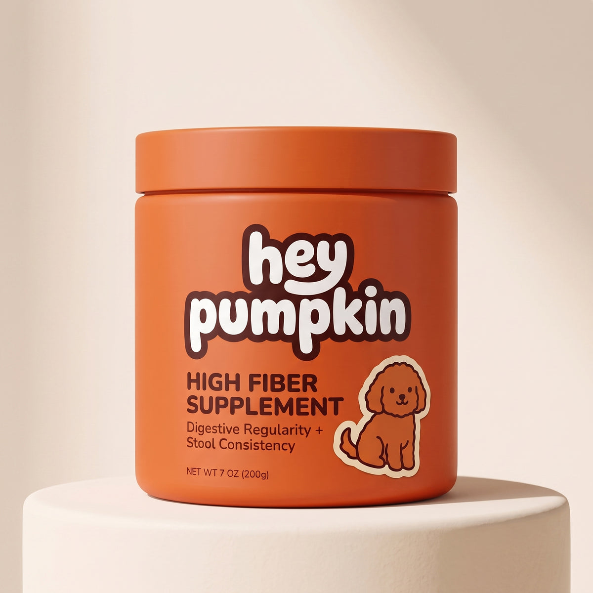 A tub of Hey Pumpkin high fiber supplement for dogs on a cream plinth